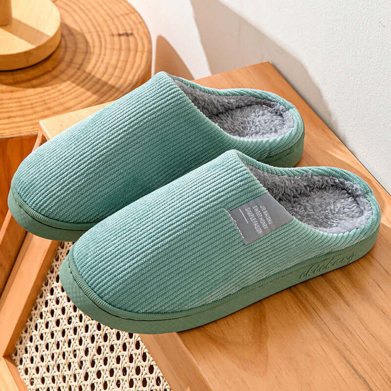 Home Indoor Wear-resistant Non Slip Cotton Slippers in calming green color with soft inner lining.